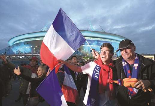 Franceu2019s supporters celebrate Franceu2019s 1-0 victory over Belgium in the World Cup semi-final outside the Saint Petersburg Stadium. (AFP)