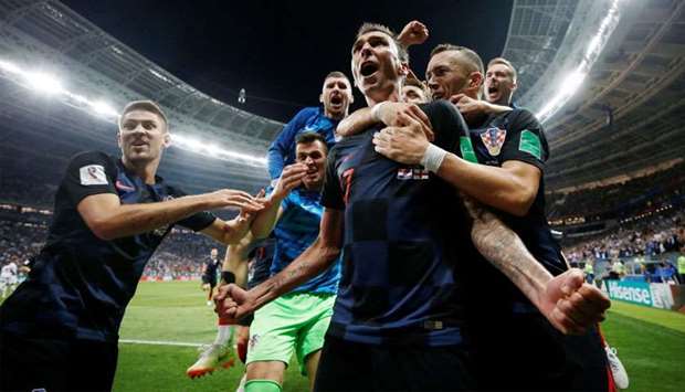 Croatia's Mario Mandzukic celebrates scoring their second goal with teammates