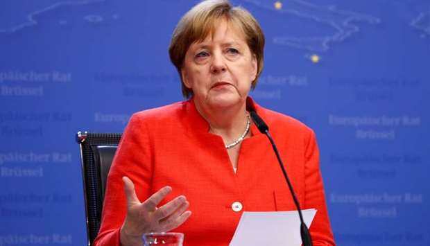 German Chancellor Angela Merkel holds a news conference following the European Union leaders summit in Brussels, Belgium.