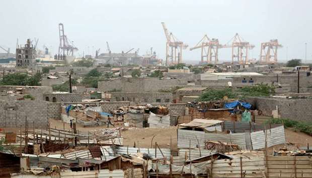 Hodeida port's cranes are pictured from a nearby shantytown in Hodeida. Reuters