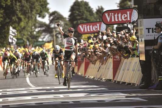 Irelandu2019s Daniel Martin celebrates as he crosses the finish line to win the sixth stage of the 105th edition of the Tour de France cycling race yesterday. (AFP)
