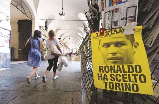 A poster saying u2018Ronaldo chose Turinu2019 is seen in downtown Turin, Italy on Wednesday. (Reuters)