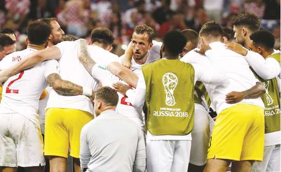 Englandu2019s Harry Kane huddles with teammates before extra time in the World Cup semi-final against Croatia on Wednesday. (Reuters)