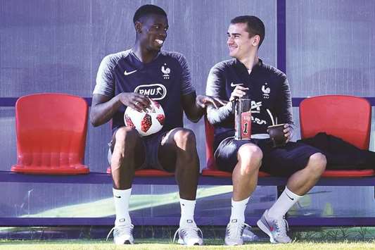 Franceu2019s Paul Pogba (left) and Antoine Griezmann take part in a training session in Istra, Russia, yesterday. (AFP)