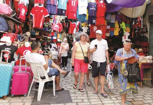 Russian tourists shop at the old Madinah in Sousse, Tunisia.