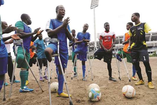 Nigeriau2019s national amputee football team train in a bare field at the national stadium in Surulere district in Lagos.