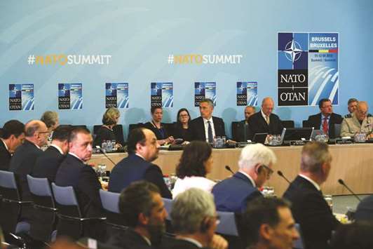Nato Secretary General Stoltenberg (centre) and other leaders at the second day of the Nato summit in Brussels.