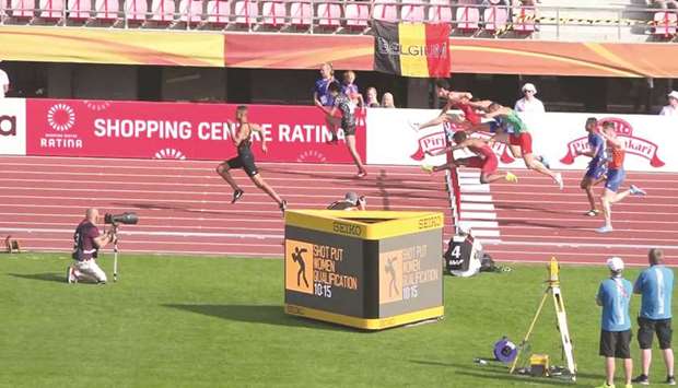 Qataru2019s Soud al-Hudmaidi (centre) in action in the 110m hurdles during the IAAF World Under-20 Championships in Tampere, Finland.
