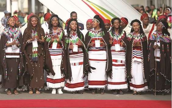 Traditional dancers perform during the welcoming ceremony of Eritreau2019s President Isaias Afwerki arriving for a three-day visit, at the Bole international airport in Addis Ababa.