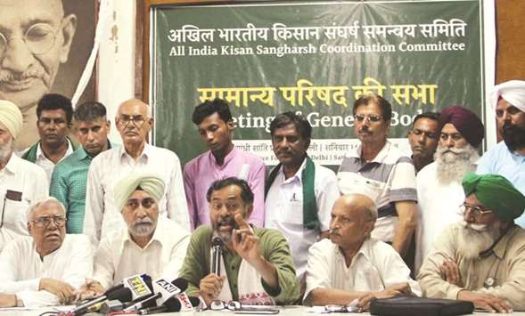 All India Kisan Sangharsh Co-ordination Committee convener V M Singh and member Yogendra Yadav address a press conference in New Delhi yesterday.