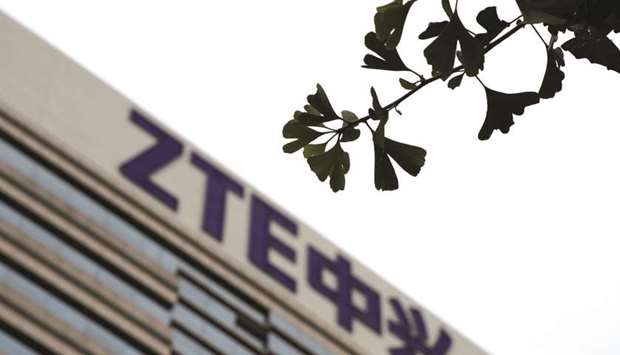 The logo of ZTE Corp is seen on the building of its research and development centre in Beijing. The US Department of Commerce on Friday removed the ban on ZTE shortly after the Chinese firm deposited $400mn in a US bank escrow account as part of a settlement reached last month.