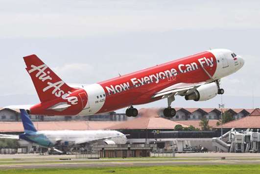 An AirAsia aircraft takes off at Soekarno-Hatta International Airport in Cengkareng, Indonesia. Airbus is closing in on a blockbuster agreement to sell $23bn worth of aircraft, based on list prices, to AirAsia Group, according to people familiar with the matter.