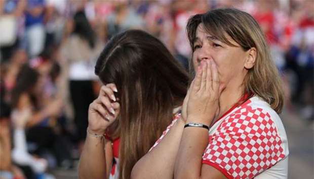 Croatia's fans react as they watch the match at Zagreb's main square.