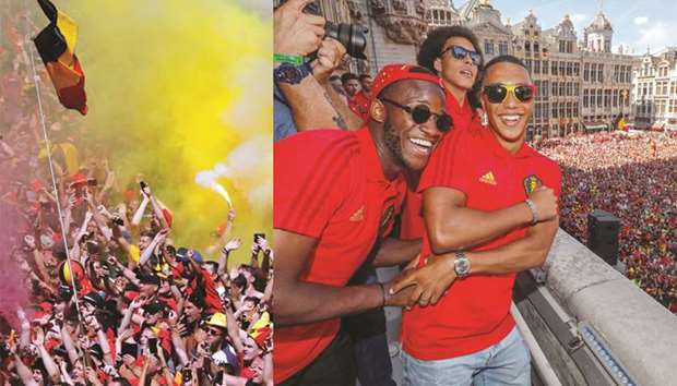 Belgiumu2019s players (Right) Michy Batshuayi, Axel Witsel and Youri Tielemans celebrate at the balcony in front of  thousands of supporters at the Grand-Place, Grote Markt in Brussels yesterday. Belgium finished third at the World Cup.