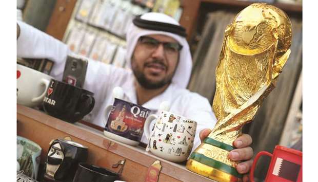 A replica of the World Cup trophy is seen at a shop in Souq Waqif in Doha on Friday. (Reuters)