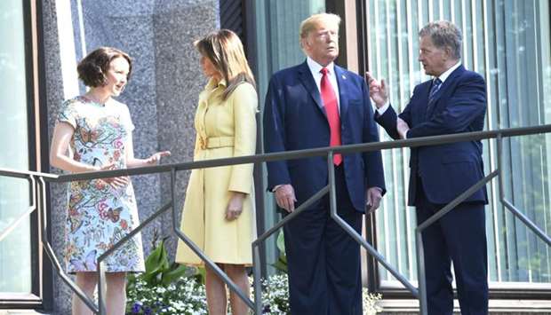 US President Donald Trump, first lady Melania Trump, Finland's President Sauli Niinisto his wife Jenni Haukio in Helsinki.