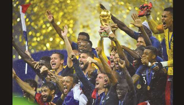 Franceu2019s Hugo Lloris lifts the trophy as they celebrate winning the World Cup  in Moscow yesterday.