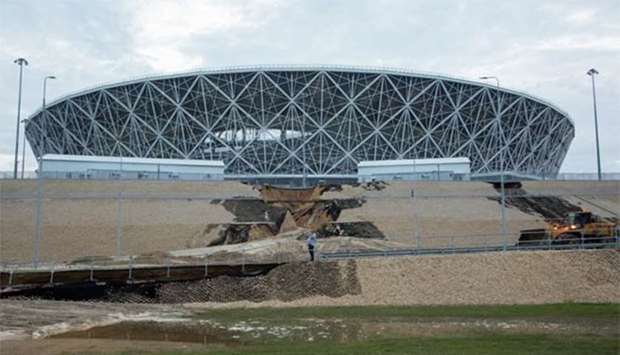 Landslide, caused by heavy rain, causes damage near the Volgograd Arena in Volgograd, a host city for the World Cup, on Monday.