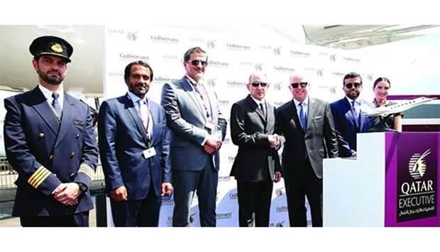 Akbar al-Baker along with other dignitaries and officials at the unveiling of the Gulfstream G500 at Farnborough International Airshow.