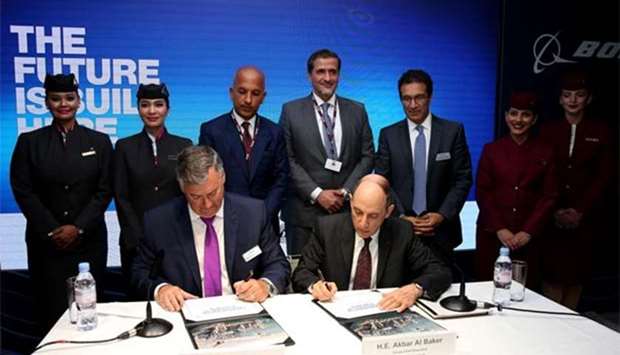 Qatar Airways Group chief executive Akbar al-Baker and Boeing Commercial Airplanes president and CEO Kevin McAllister signing the agreement in the presence of HE the Minister of Finance and Qatar Airways chairman Ali Sharif al-Emadi and other dignitaries.
