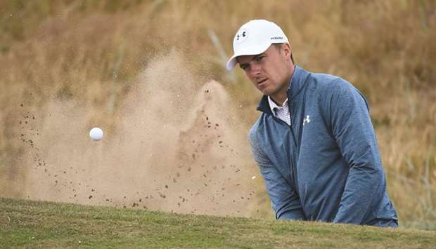 Jordan Spieth plays from a green-side bunker on the 1st hole during a practice session at The 147th Open golf Championship at Carnoustie, Scotland, yesterday. (AFP)