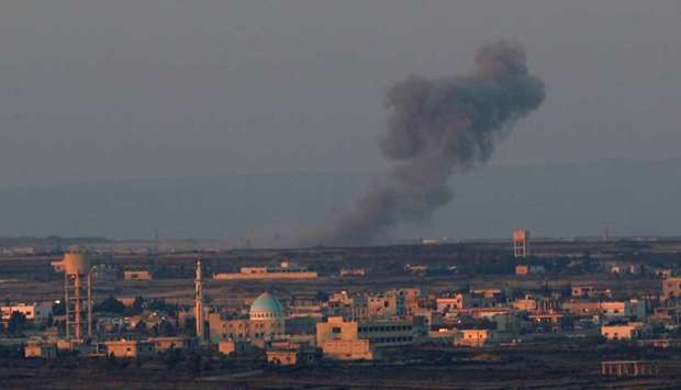 Smoke rises from Quneitra area, Syria. Reuters