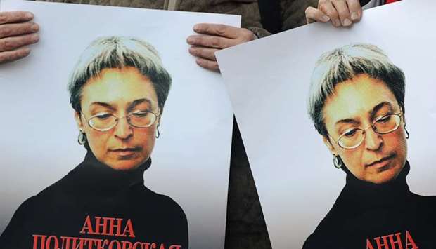 Russian human rights activists attend a rally in honour of slain Russian journalist Anna Politkovskaya in Moscow.  File photo taken on October 7, 2010.