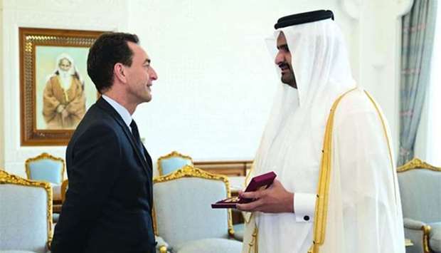 His Highness the Deputy Amir Sheikh Abdullah bin Hamad al-Thani with the outgoing French ambassador to Qatar Eric Chevallier.