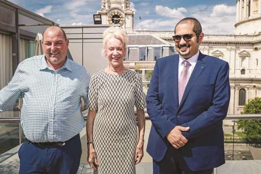 Qatar Racing and Equestrian Club general manager Nasser Sherida al-Kaabi (right) with the owner and trainer of Al Rayyan Stakes winner Tip Two Win, Anne Cowley (centre) and Roger Teal (left).
