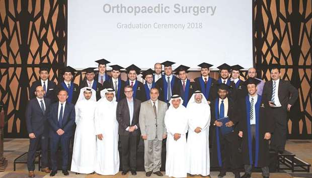 The new physicians with HMC officials.