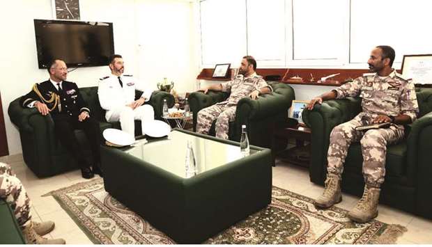 Personnel of Qatar Amiri Naval Forces and French navy at a meeting in Doha.