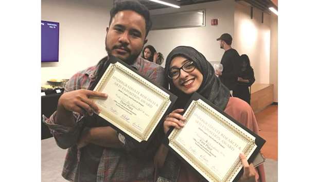 NU-Q graduates Zaki Hussain and Neha Rashid who won awards for their short film, Terima Kasih, and documentary Kiln at Northwesternu2019s annual research expo on the home campus in the US.