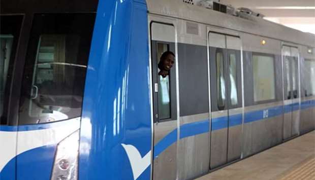 A passenger smiles as he looks out of the newly commissioned Abuja light rail train.