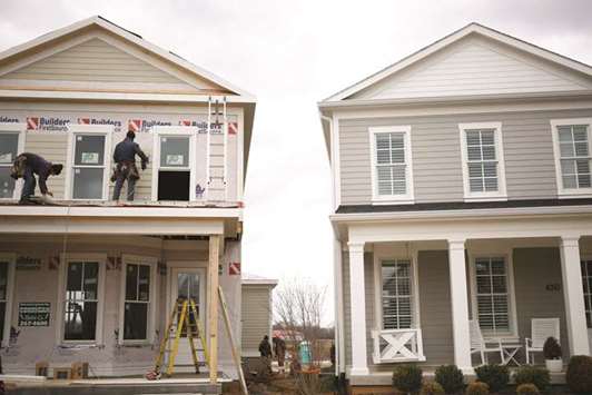 Contractors working on a home under construction in the Norton Commons subdivision of Louisville, Kentucky, US (file). The US housing market is lagging overall economic growth, which appears to have accelerated in the second quarter after hitting a soft patch at the start of the year.