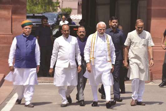 Prime Minister Narendra Modi arrives at Parliament House ahead of the monsoon session in New Delhi yesterday.