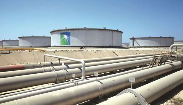 File photo: A general view of Aramco tanks and oil pipe at Saudi Aramcou2019s Ras Tanura oil refinery and oil terminal.