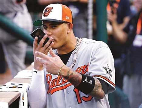 American League infielder Manny Machado of the Baltimore Orioles talks on a cell before the 2018 MLB All Star Game at Nationals Ballpark. PICTURE: USA TODAY Sports