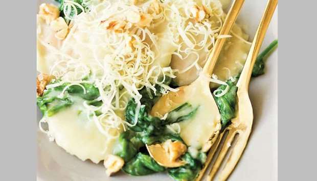 DELICIOUS: Butternut Squash Ravioli is garnished with basil sprig and served hot. Photo by the author
