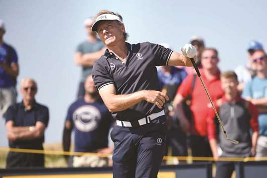 Germanyu2019s Bernhard Langer reacts to his iron shot on the 5th tee during his first round on day one of The 147th Open Golf Championship at Carnoustie, Scotland.