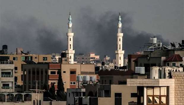 Smoke plumes rising from Israeli bombardment in Gaza City. Israeli aircraft and tanks hit targets throughout the Gaza Strip on Friday after shots were fired at troops along the border.