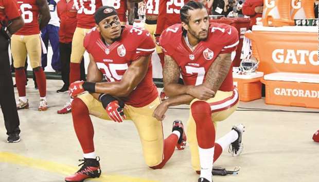 Free agents Colin Kaepernick (right) and Eric Reid are suing the NFL, saying league owners colluded to keep them unsigned as retaliation for the protests.