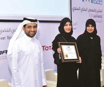 QU officials mark the occasion.