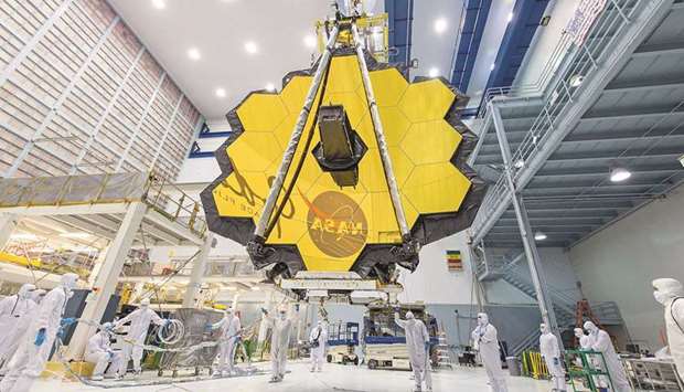 AT WORK: Nasa technicians lift the primary mirror of the James Webb Space Telescope at the Goddard Space Flight Center in Greenbelt, Maryland in April.