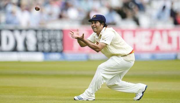 In this July 5, 2014, picture, MCCu2019s captain Sachin Tendulkar prepares to catch a ball during a match against a Rest of the World team to celebrate 200 years of Lordu2019s at Lordu2019s cricket ground in London. (Reuters)