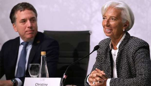 Argentina's Economy Minister Nicolas Dujovne (left) and International Monetary Fund Managing Director Christine Lagarde address a joint press conference in Buenos Aires on Saturday,