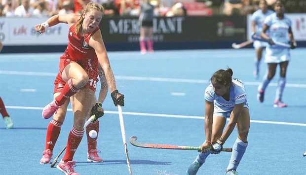 India and England players in action during their Pool B World Cup opener yesterday.