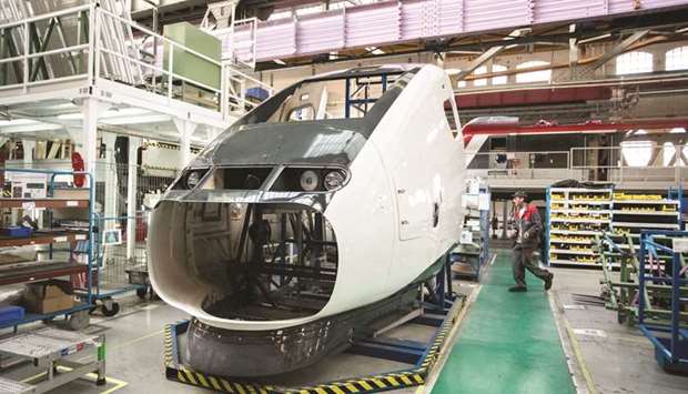 The cockpit bodywork of a TGV railway train is seen on the production line inside the Alstom high-speed factory in Belfort. Franceu2019s move to tighten takeover rules comes after several national champions such as Alstom and Alcatel-Lucent changed flags in recent years under deals that many political heavyweights deemed unfair or detrimental to the state.