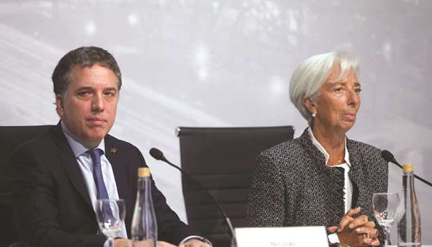 International Monetary Fund managing director Christine Lagarde and Argentinau2019s treasury minister Nicolas Dujovne attend a news conference in Buenos Aires. The IMF warned world economic leaders yesterday that a recent wave of trade tariffs would significantly harm global growth, a day after US President Donald Trump threatened a major escalation in a dispute with China.