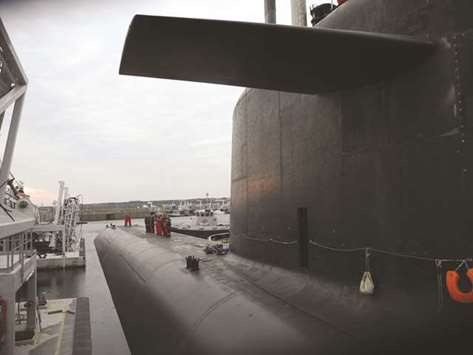 This file photo taken on October 1, 2016 shows the French Navyu2019s Triumphant-class strategic nuclear submarine u2018Le Vigilantu2019 at its submarine base of Lu2019Ile Longue, near Brest, before departing for a mission.