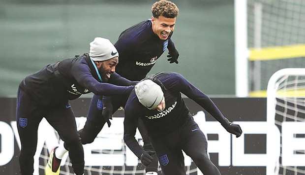Englandu2019s Danny Rose (left), Dele Alli (centre) and Jamie Vardy fool around during a training session in Saint Petersburg, Russia, yesterday. (Reuters)